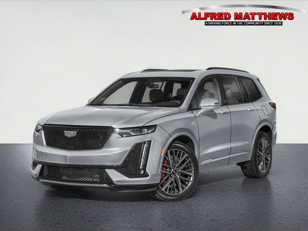 2025 Cadillac XT6 Sport in Crystal White Tricoat — front three-quarter view