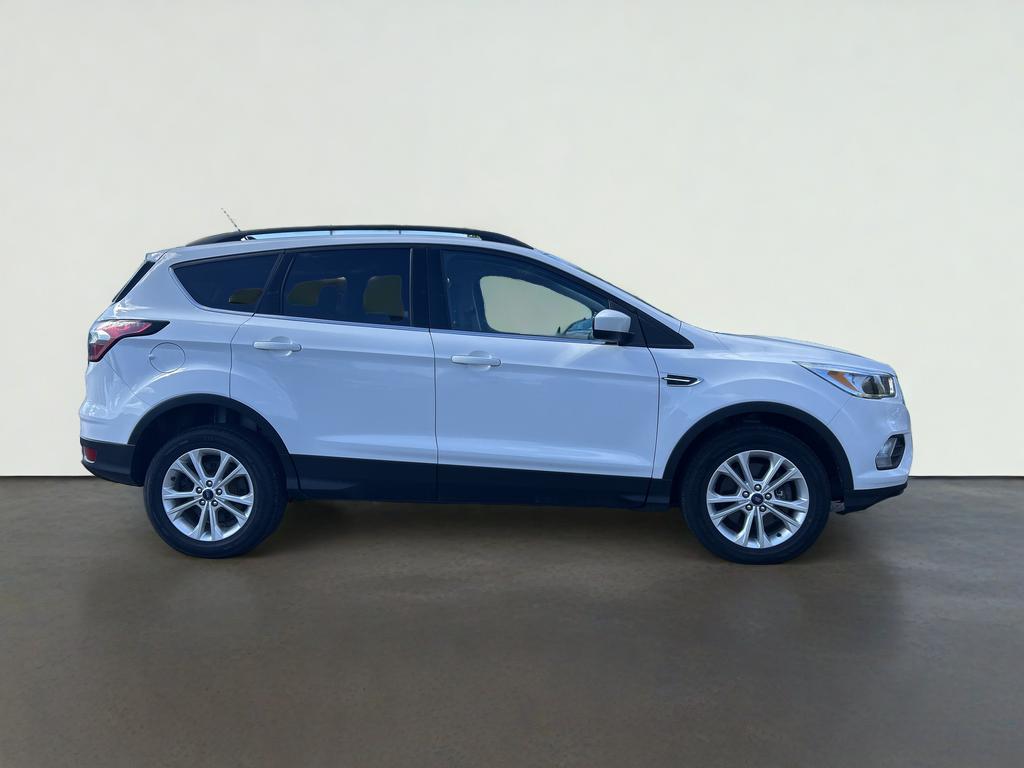 Used 2018 Ford Escape SE with VIN 1FMCU9GDXJUC04616 for sale in Kalkaska, MI